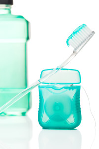tooth brush, floss, and mouthwash