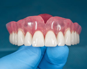 how to save money on dentures