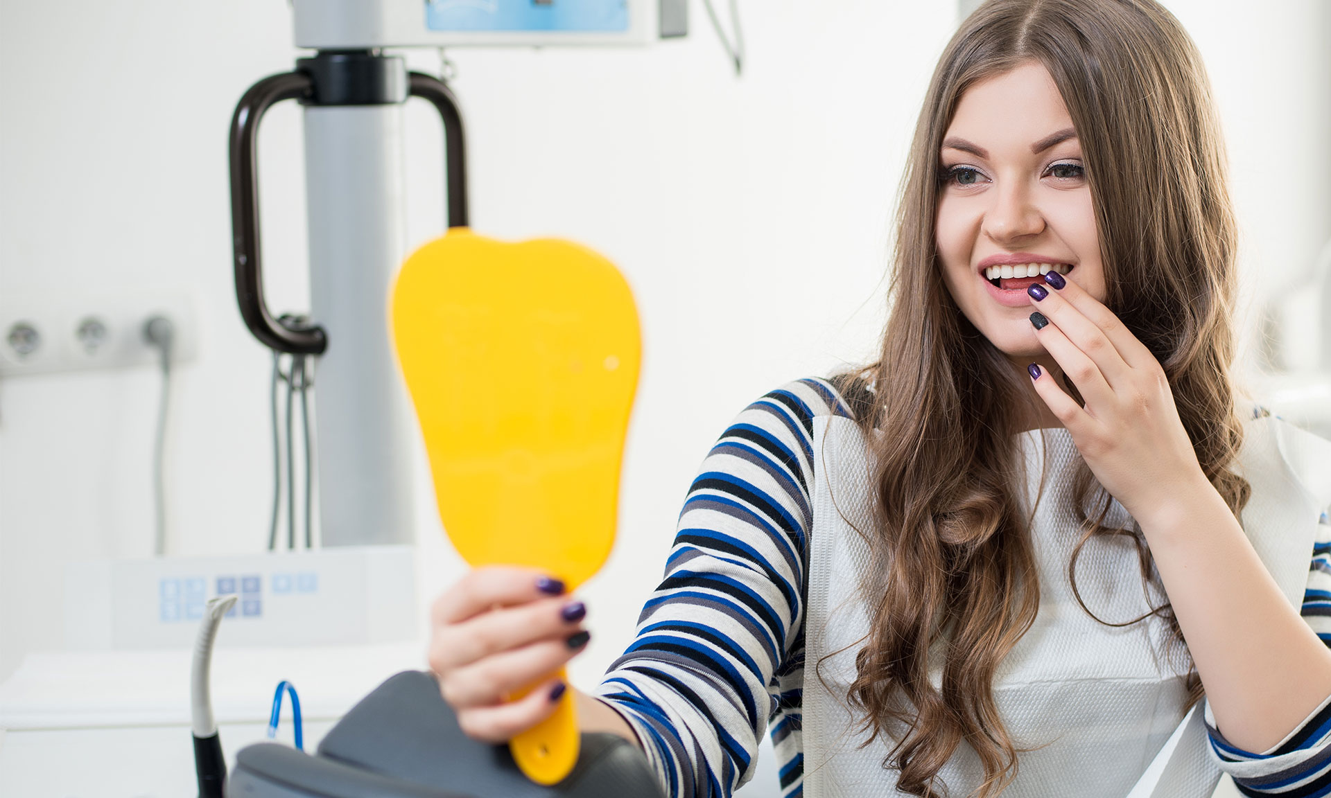 Young Female Model Smiling After her Braces were removed