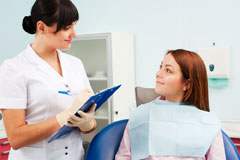 A dentist treating a patient