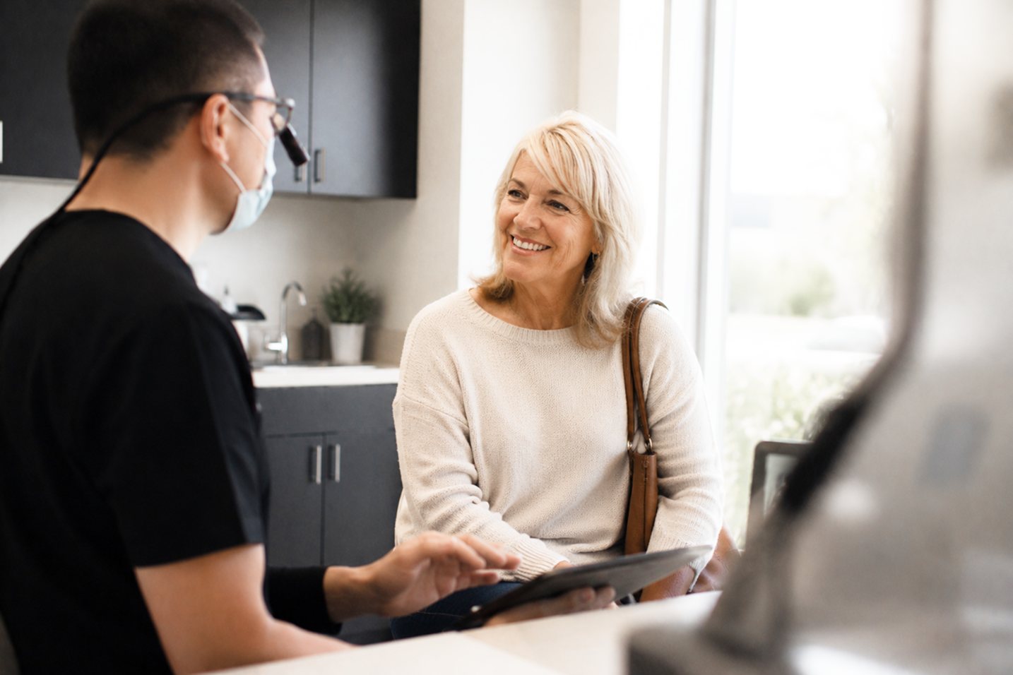 Dental implant recovery — patient smiling after successful implant procedure