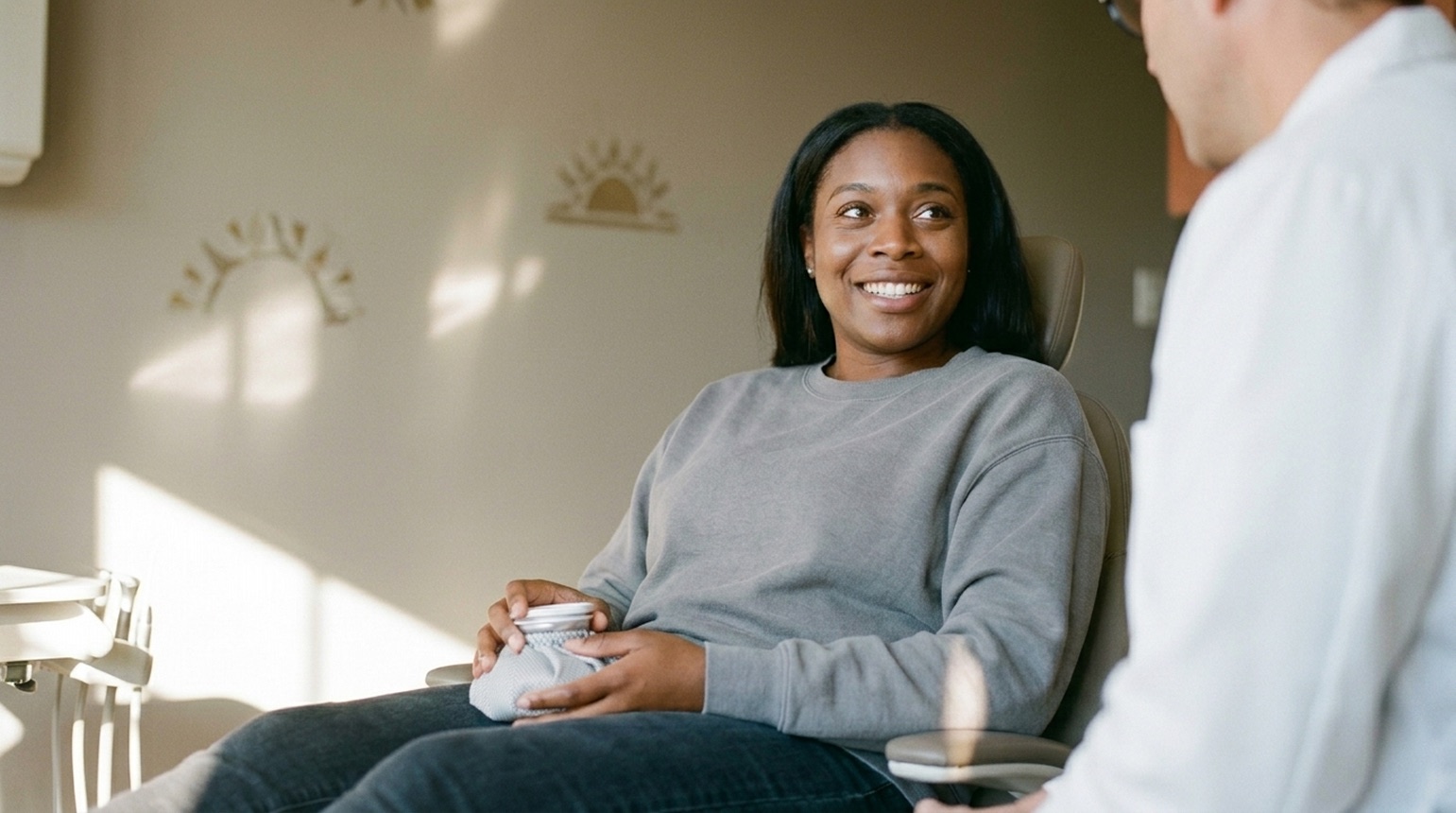 Relaxed patient smiling in the dental chair at Island Dental