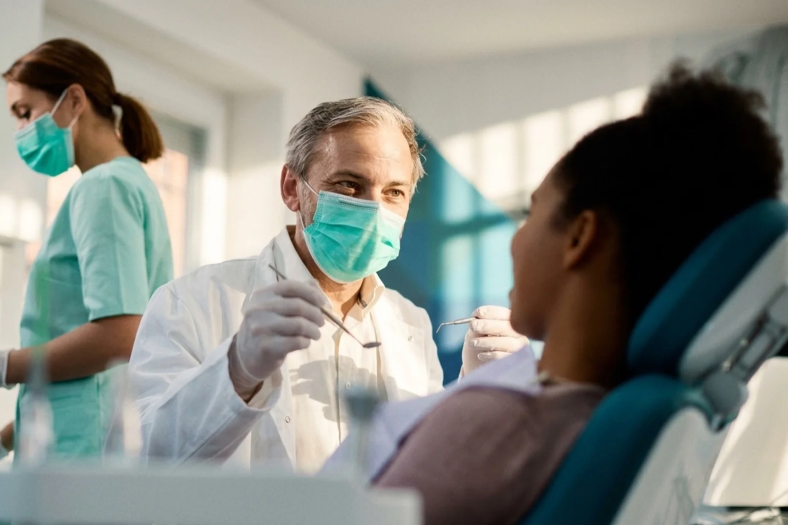 The Island Dental care team with a patient