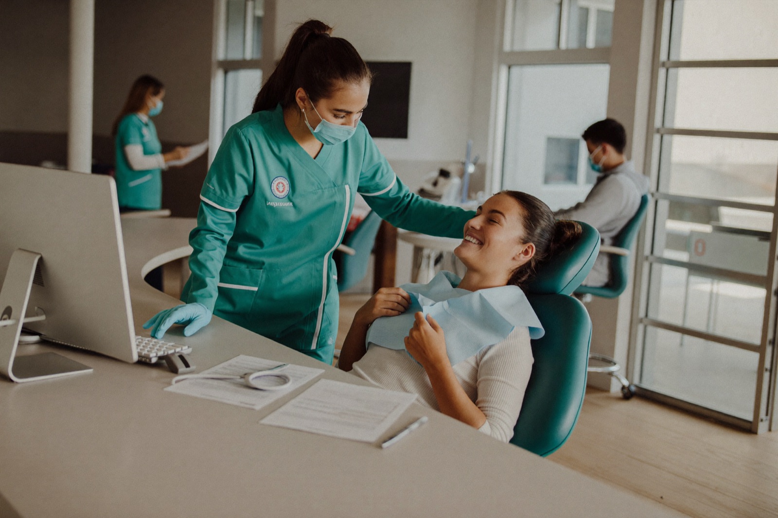 Island Dental team member walking a patient through financing options