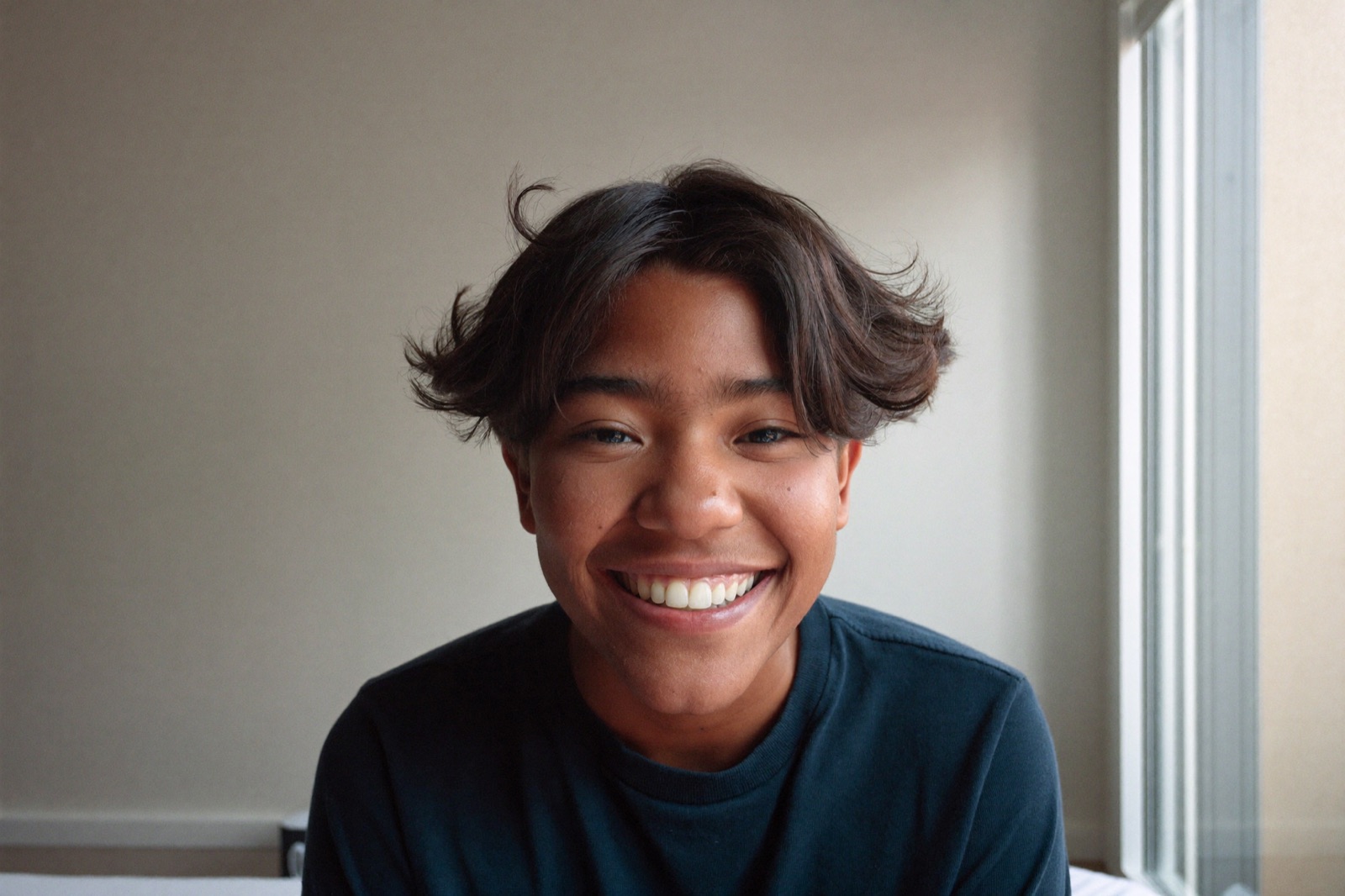 Smiling teen during retainer aftercare