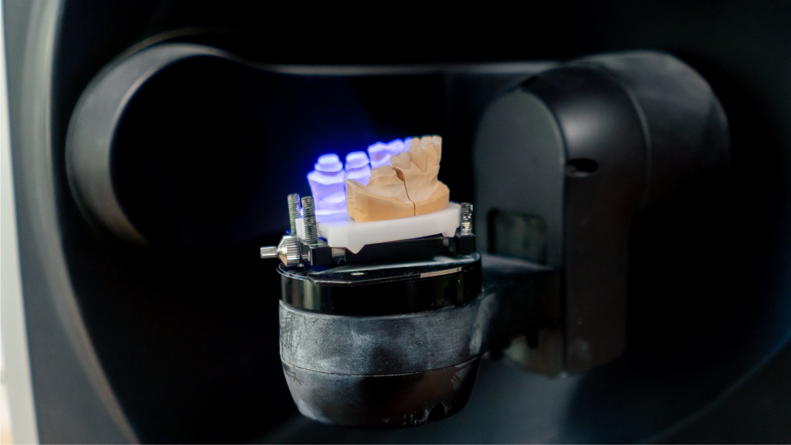 Island Dental in-house milling machine crafting a restoration