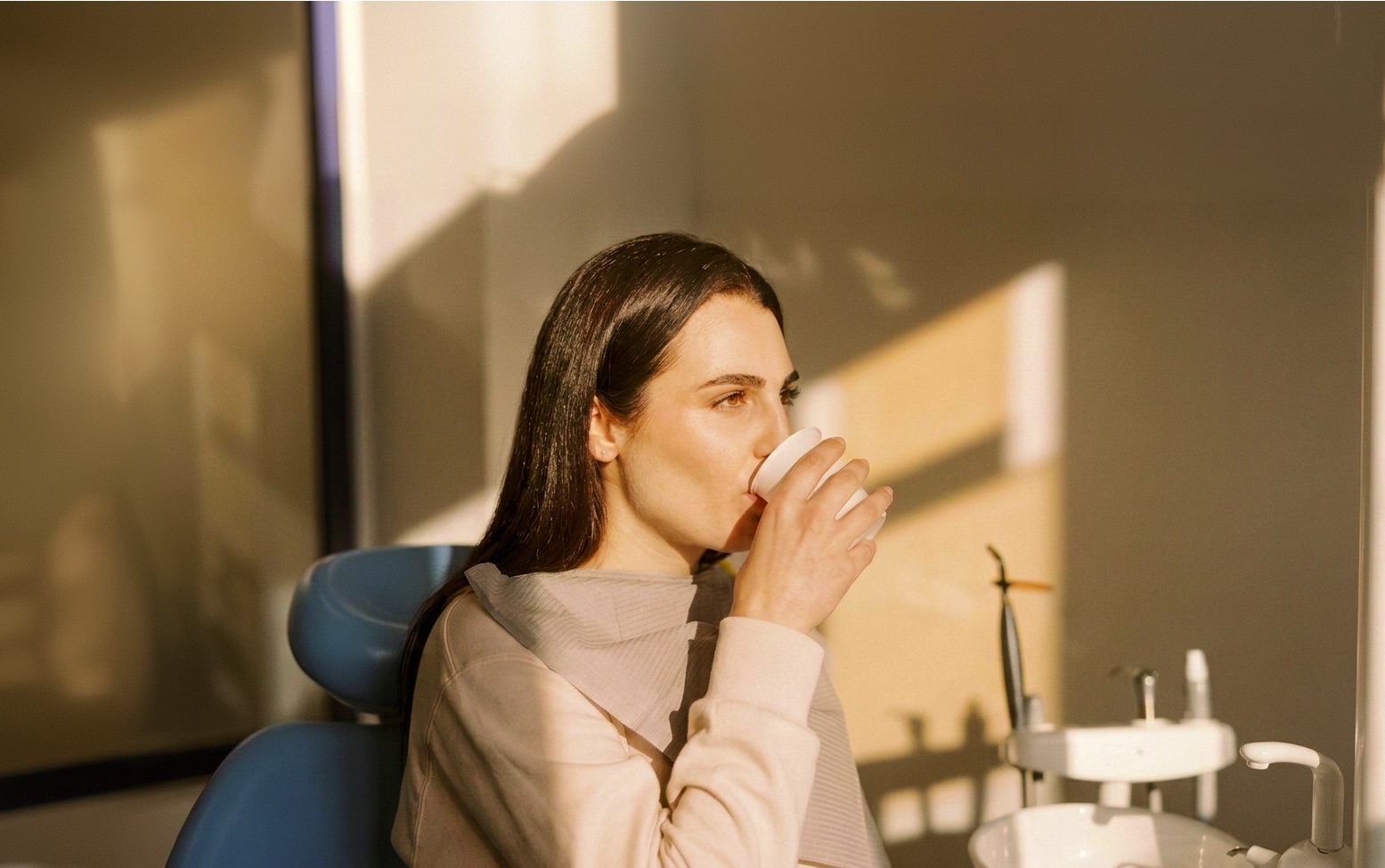 Patient taking oral sedation medication before treatment at Island Dental
