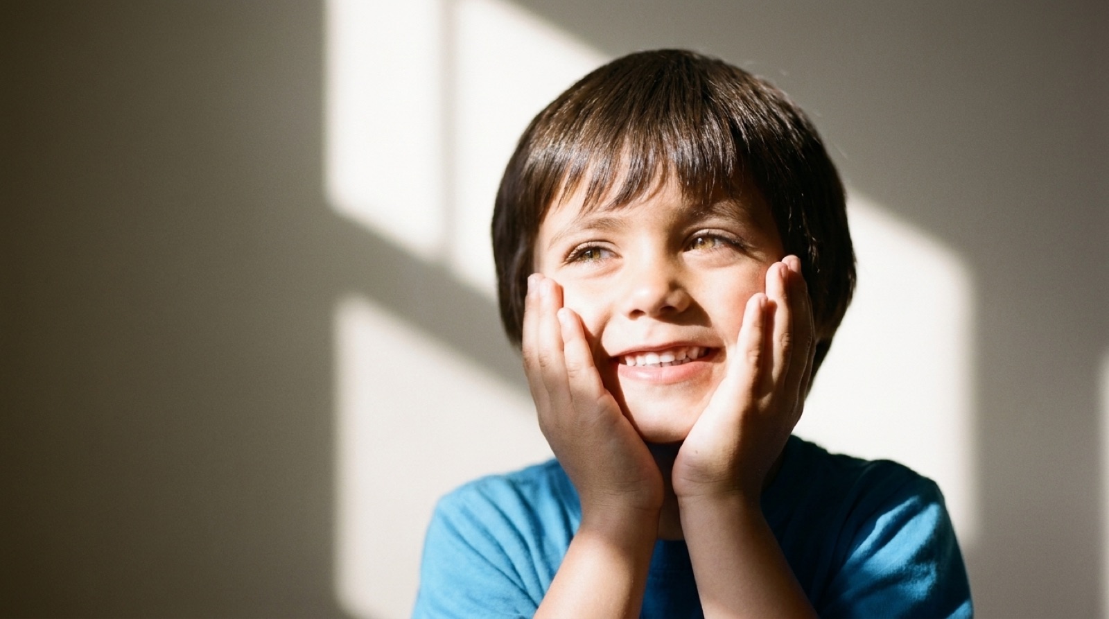 Smiling young patient in the dental chair at Island Dental