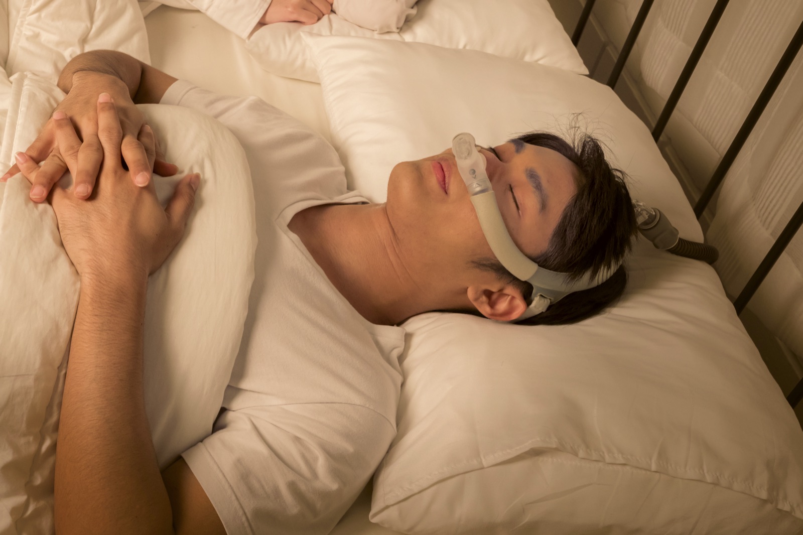 Patient sleeping comfortably while wearing a sleep appliance